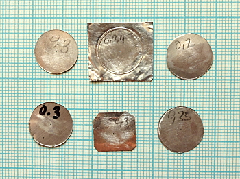 pinholes made in beer-can aluminium